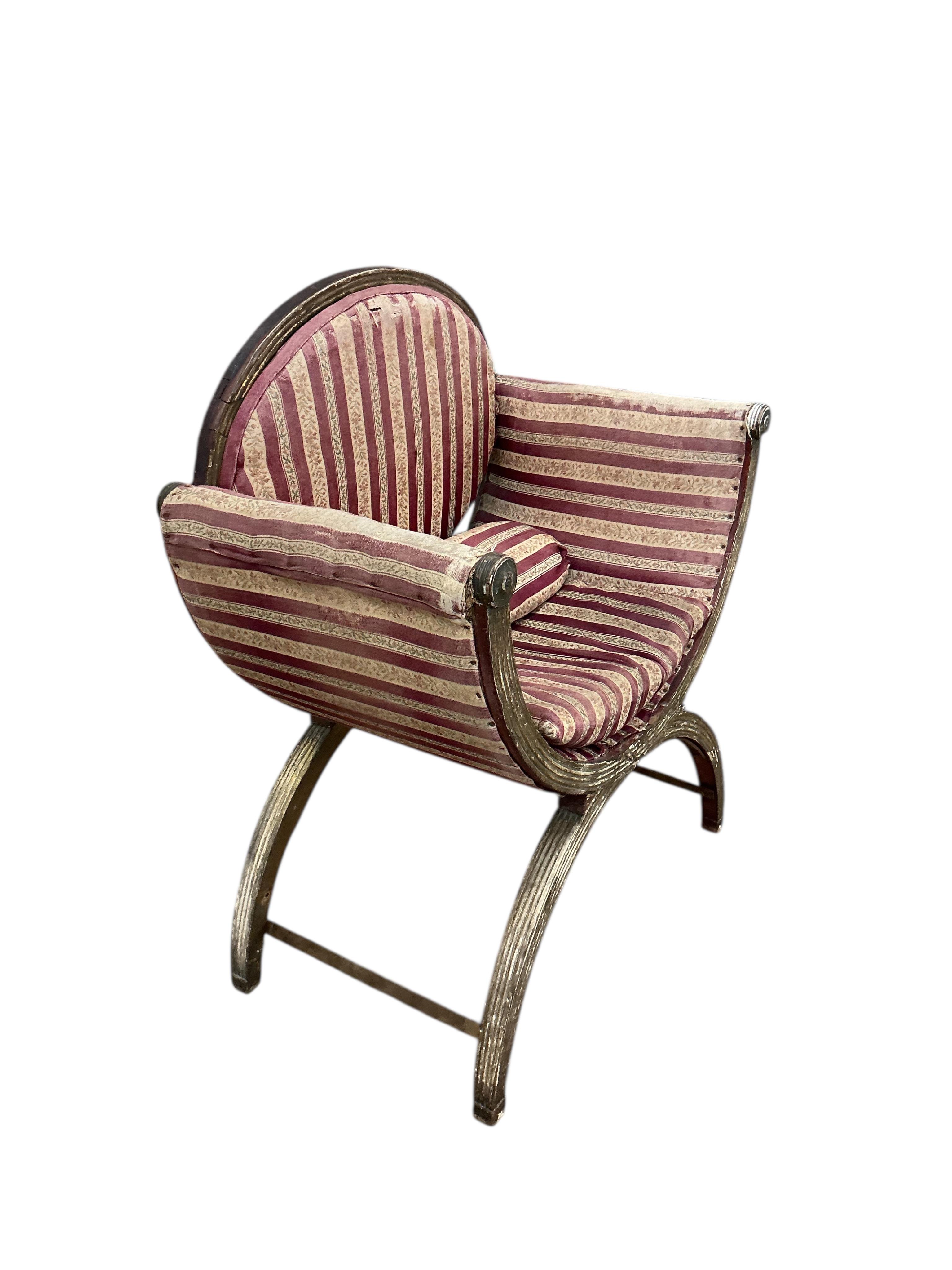 A Regency gilt 'X' framed chair, width 68cm, depth 42cm, height 84cm